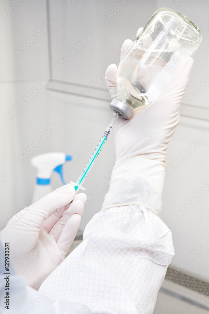 reseacher prepares injection reseacher prepares injection