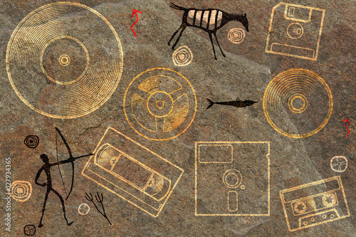 Seamless ornament depicting prehistoric cave paint with hunters animals and floppy disk, tape, and the plate. photo