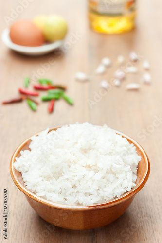 cooked rice on wood table