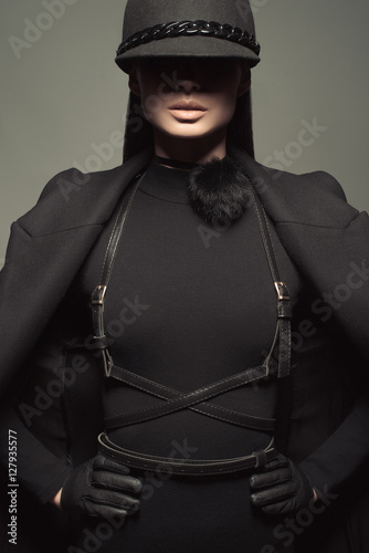 Elegance dressed fashionable model in jockey cap