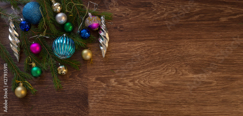 New Year tree decorations wooden background