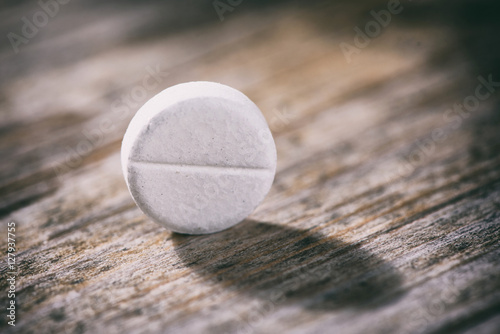 round pills paracetamol or aspirin photo