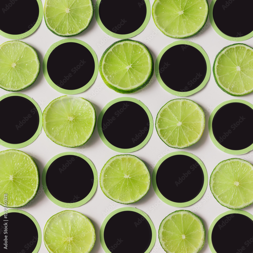 Pattern made of lime slices and stickers