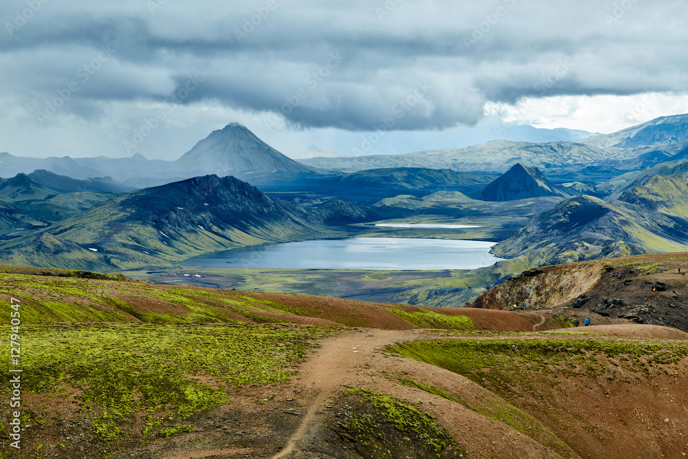 Valley National Park Landmannalaugar. Magnificent Iceland in the August. beautiful valley between the mountains and the smooth mountain lake