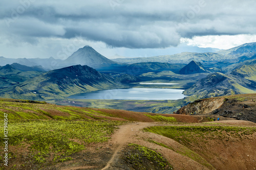 Valley National Park Landmannalaugar. Magnificent Iceland in the August. beautiful valley between the mountains and the smooth mountain lake