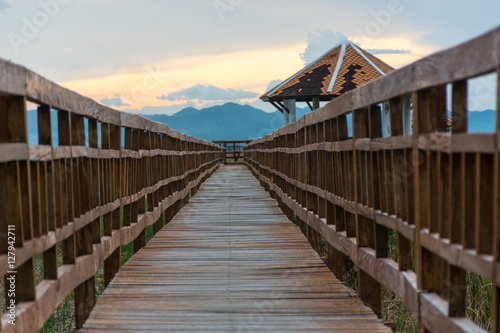 Sunset long wooden bridge in Sam Roi Yot National Park ,Prachuap