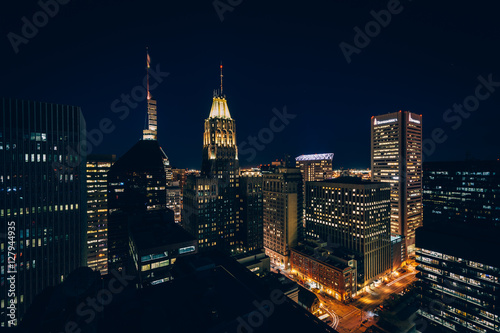 View of buildings in downtown at night  in Baltimore  Maryland.