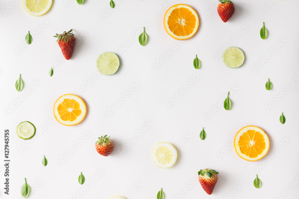 Colorful pattern made of citrus fruits and strawberries. Flat la Colorful pattern made of citrus fruits and strawberries. Flat la