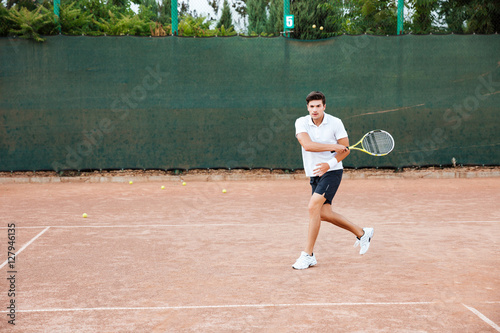 Tennis player man playing © Drobot Dean
