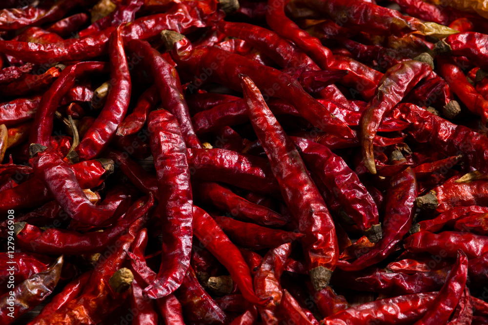 The heap of red hot chili pepper dried The heap of red hot chili pepper dried