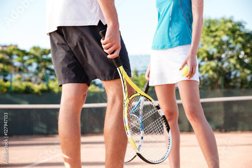 Legs of tennis couple © Drobot Dean