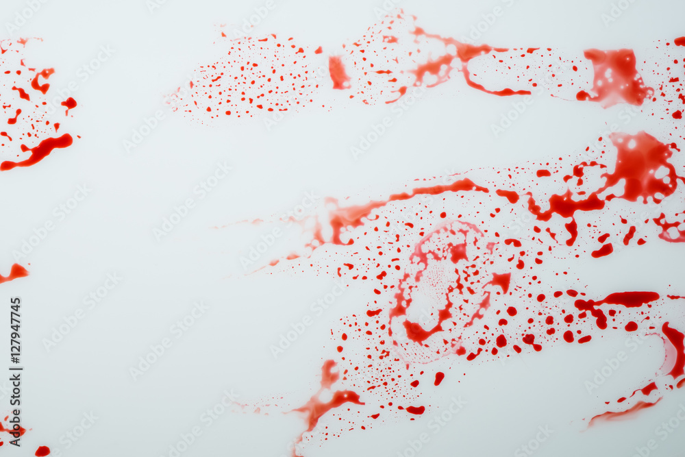 Blood drips on white surface Blood drips on white surface