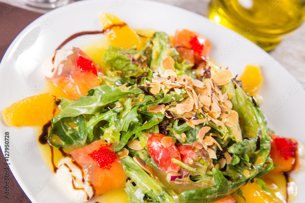 salad with red fish and orange