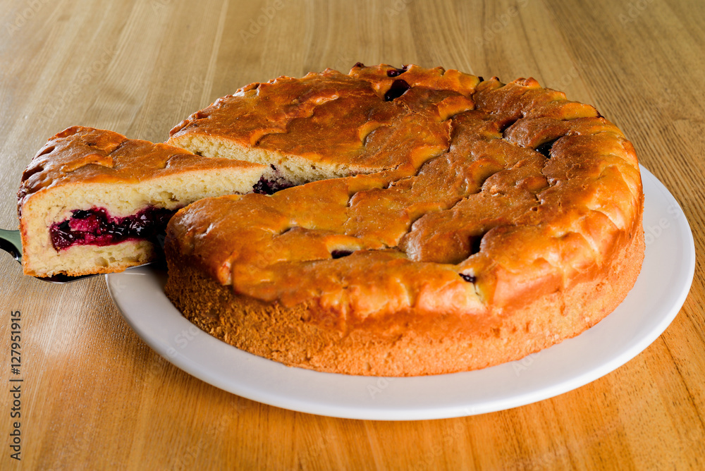 Cherry pie with a slice Cherry pie with a slice