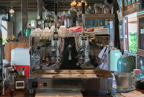 Professional coffee machine making espresso in a cafe  