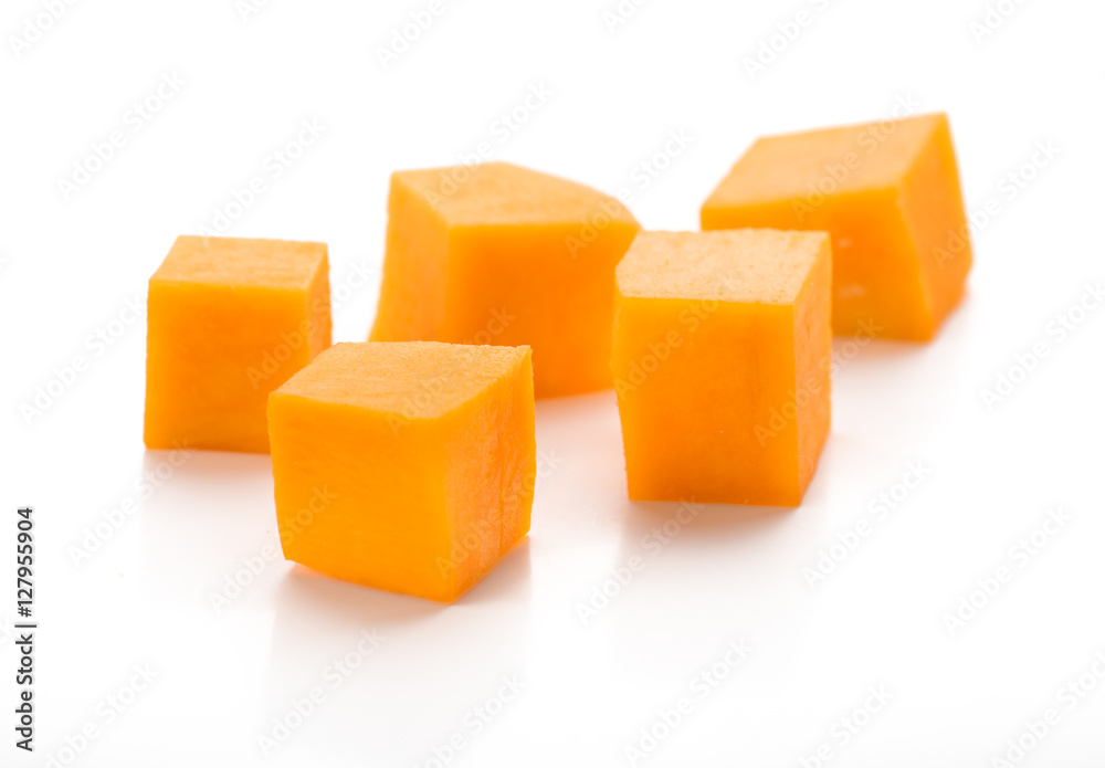 Pumpkin vegetable cube slice isolated on white background Pumpkin vegetable cube slice isolated on white background