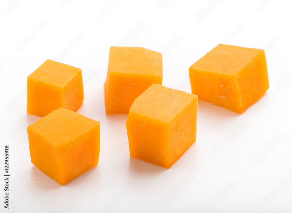 Pumpkin vegetable cube slice isolated on white background Pumpkin vegetable cube slice isolated on white background