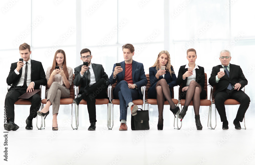 Fototapeta premium Employees carefully listening to their boss at a business meeti