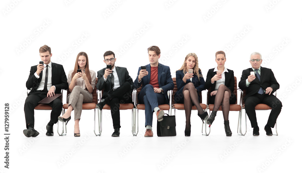Fototapeta premium Employees carefully listening to their boss at a business meeti