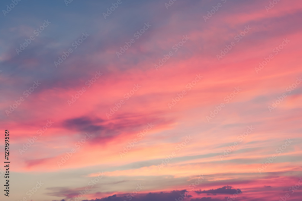 Dramatic sunset sky with clouds.Blur or Defocus image.