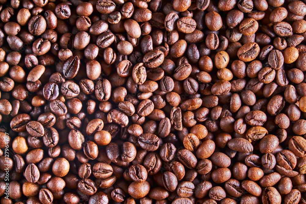 Fototapeta premium aromatic roasted coffe beans background, pattern