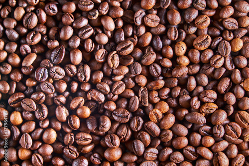 aromatic roasted coffe beans background, pattern