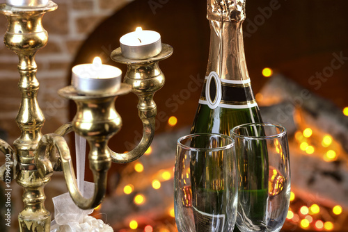 champagne glasses with the fireplace