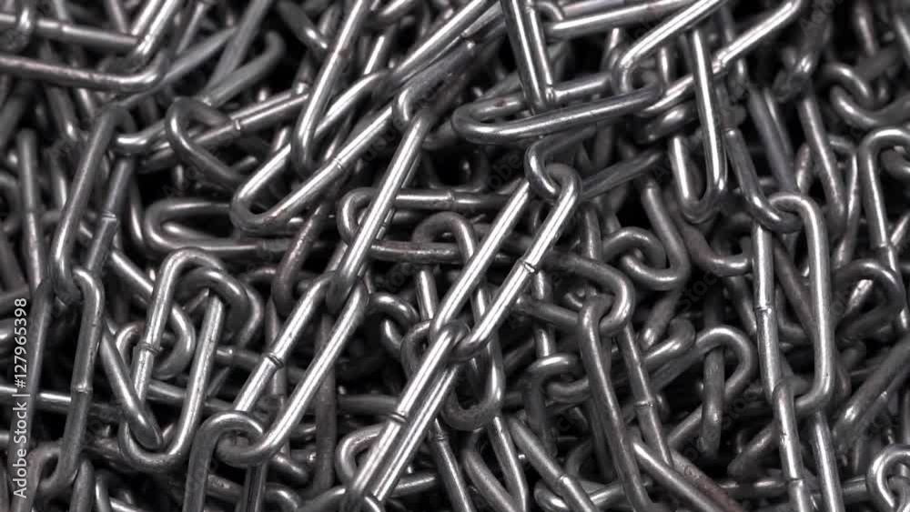 Metal chain rotating background. Closeup Metal chain rotating background. Closeup