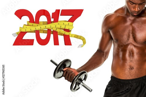 Composite image of mid section of fit shirtless young man liftin photo