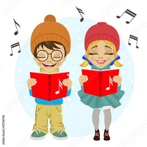 little boy and girl singing Christmas carols