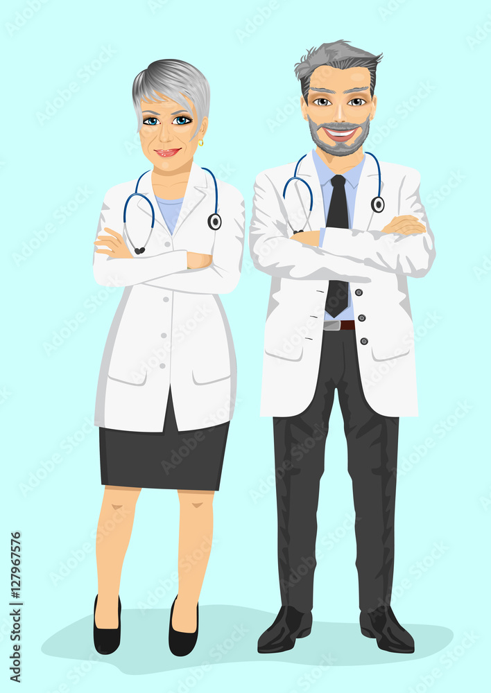 mature doctors standing with arms folded mature doctors standing with arms folded