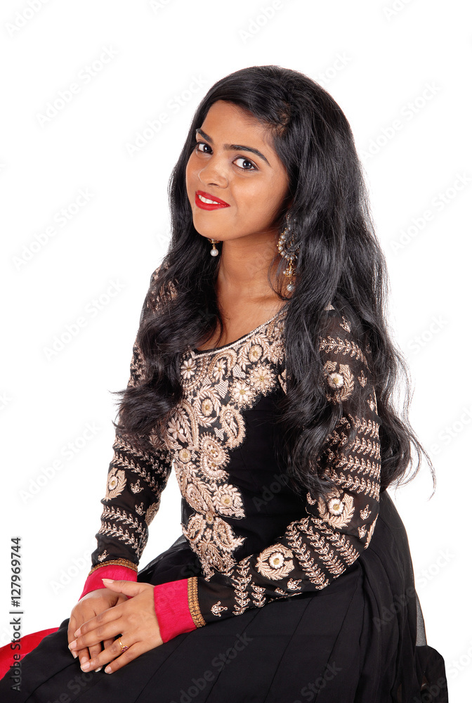Smiling woman sitting. Smiling woman sitting.