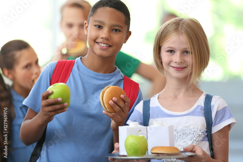 Cute kids eating in school