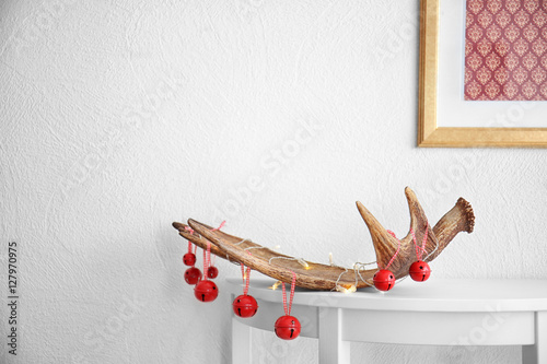 Decorated moose horn on whi...