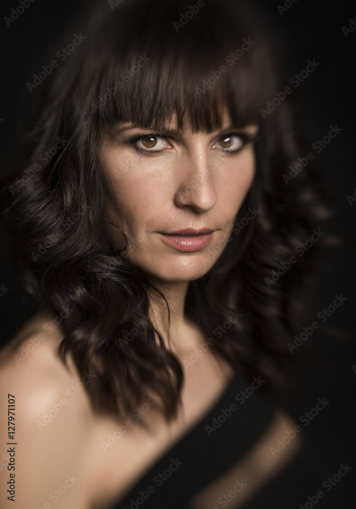 Portrait of a young woman looking at camera