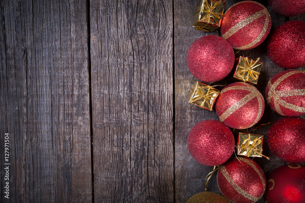 New year balls frame on rustic wooden background New year balls frame on rustic wooden background