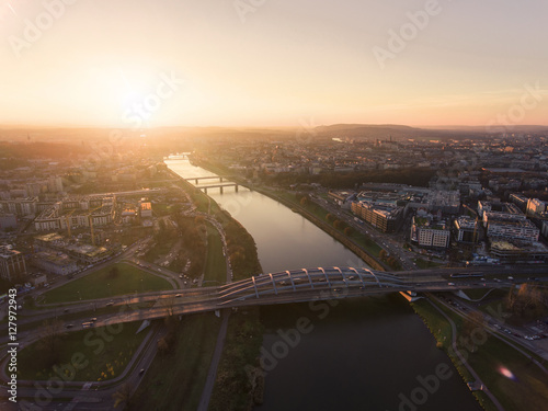Aerial view of the Vistula River in Krakow with modern bridge
