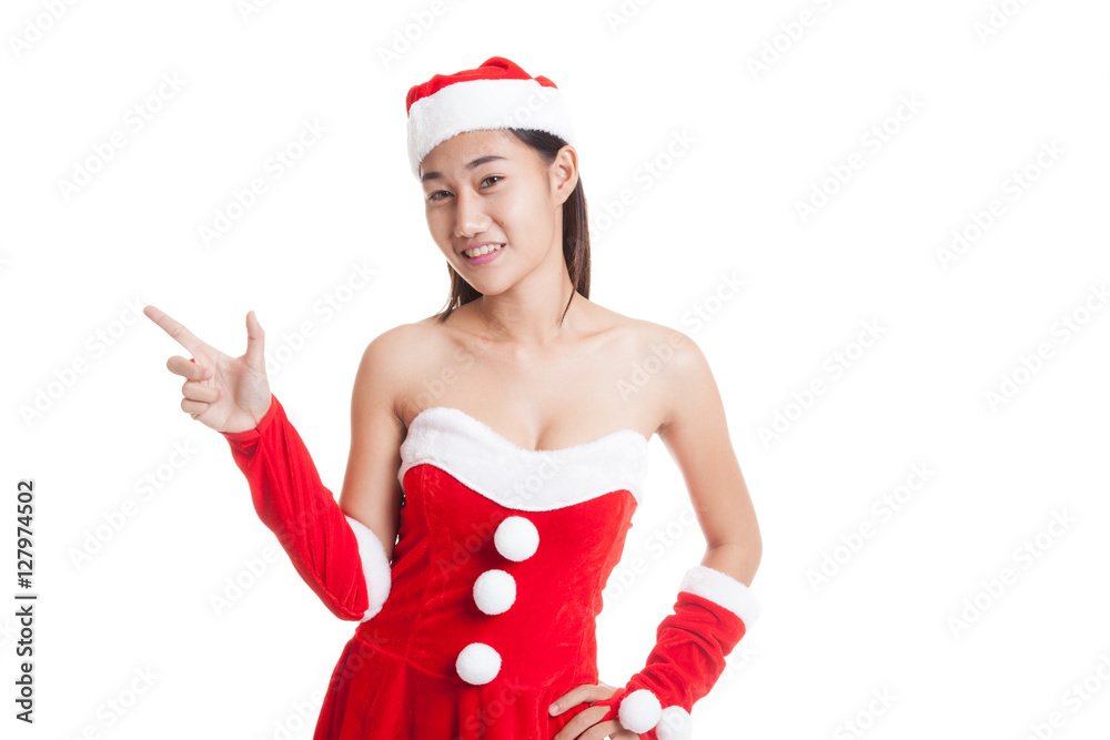 Asian Christmas Santa Claus girl point to blank space. Asian Christmas Santa Claus girl point to blank space.