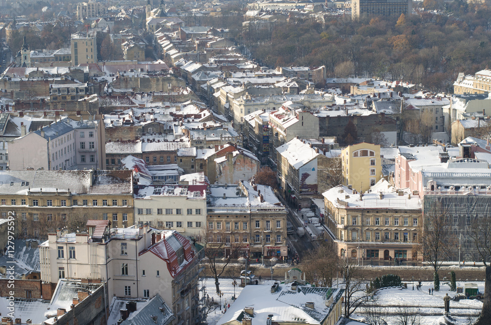 Winter panorama of Lviv covered by snow, Ukraine.Lviv or Lvov, Eastern Ukraine - the view of the city from the city hall clock tower.