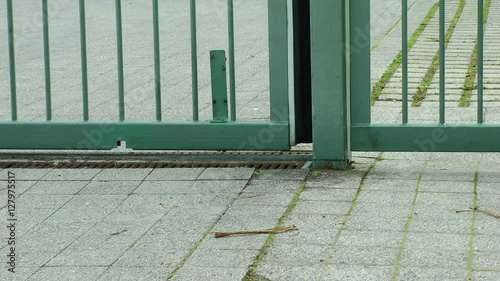 close-up of a closing modern sliding gate