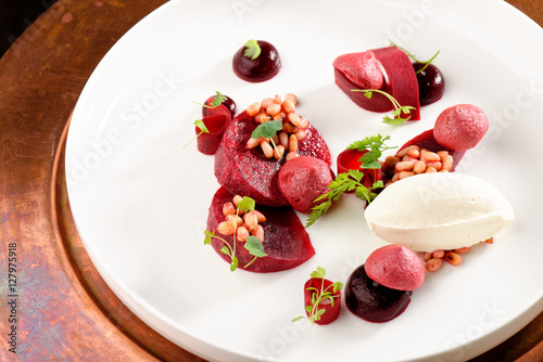 Fine dining dessert, Beet root, cherry Parfait, ice cream, white chocolate mousse and spices