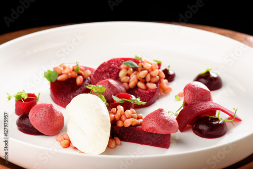 Fine dining dessert, Beet root, cherry Parfait, ice cream, white chocolate mousse and spices