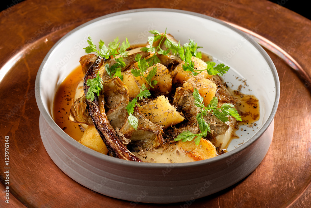 Roasted potato with artichokes and truffles Roasted potato with artichokes and truffles