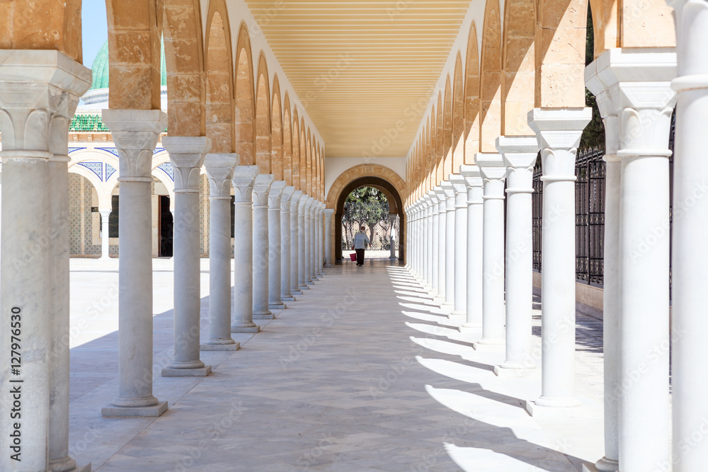 MONASTIR, TUNISIA, AFRICA-CIRCA MAY, 2012: Inner yard of the Tunisian President Habib Bourguiba museum in Monastir, Tunisia, Africa. Long arches corridor