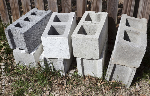 Small stack of construction concrete cinder blocks. Horizontal. photo