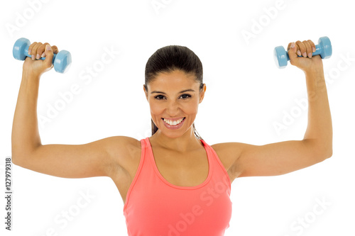  attractive happy latin woman holding weight dumbbell doing fitness workout