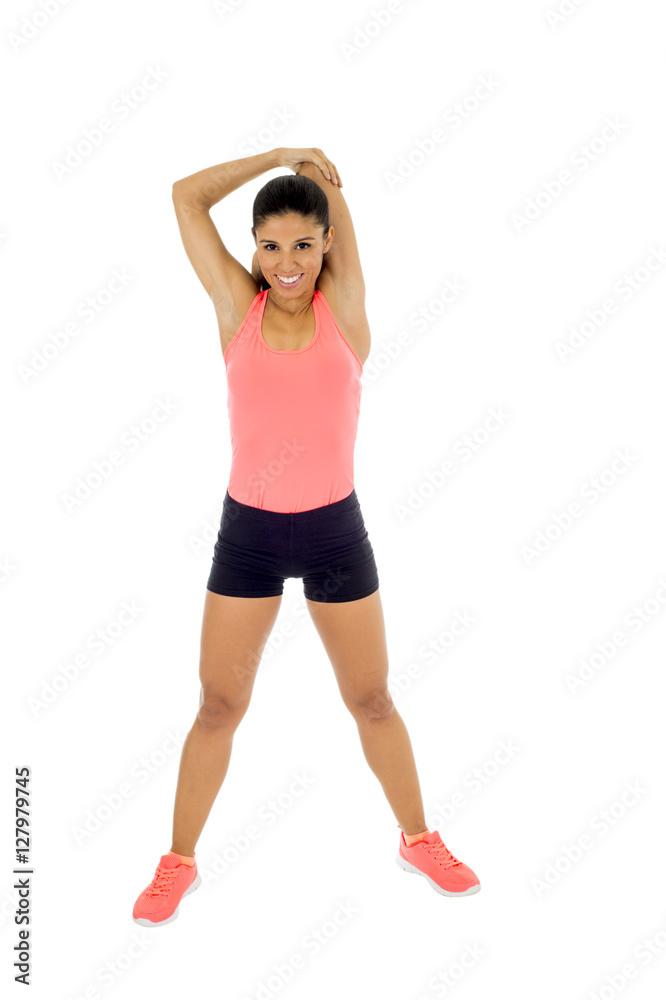 happy beautiful latin woman stretching body muscles doing fitness workout happy beautiful latin woman stretching body muscles doing fitness workout