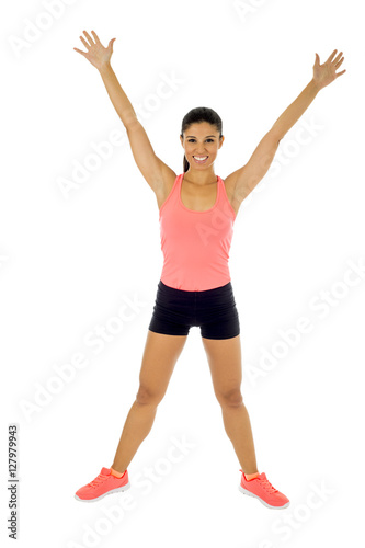 happy beautiful latin woman stretching body muscles doing fitness workout