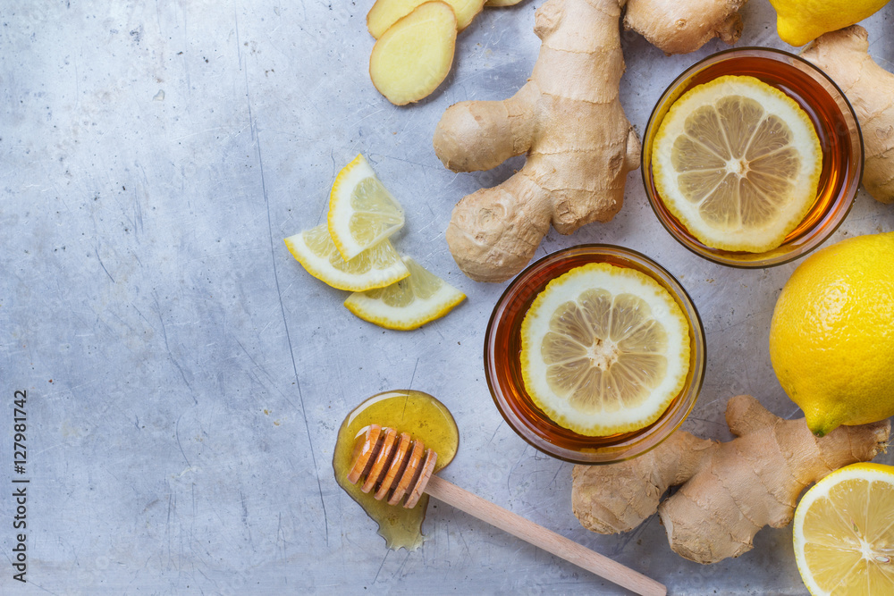 Ginger tea in a glass for flu cold winter days Ginger tea in a glass for flu cold winter days