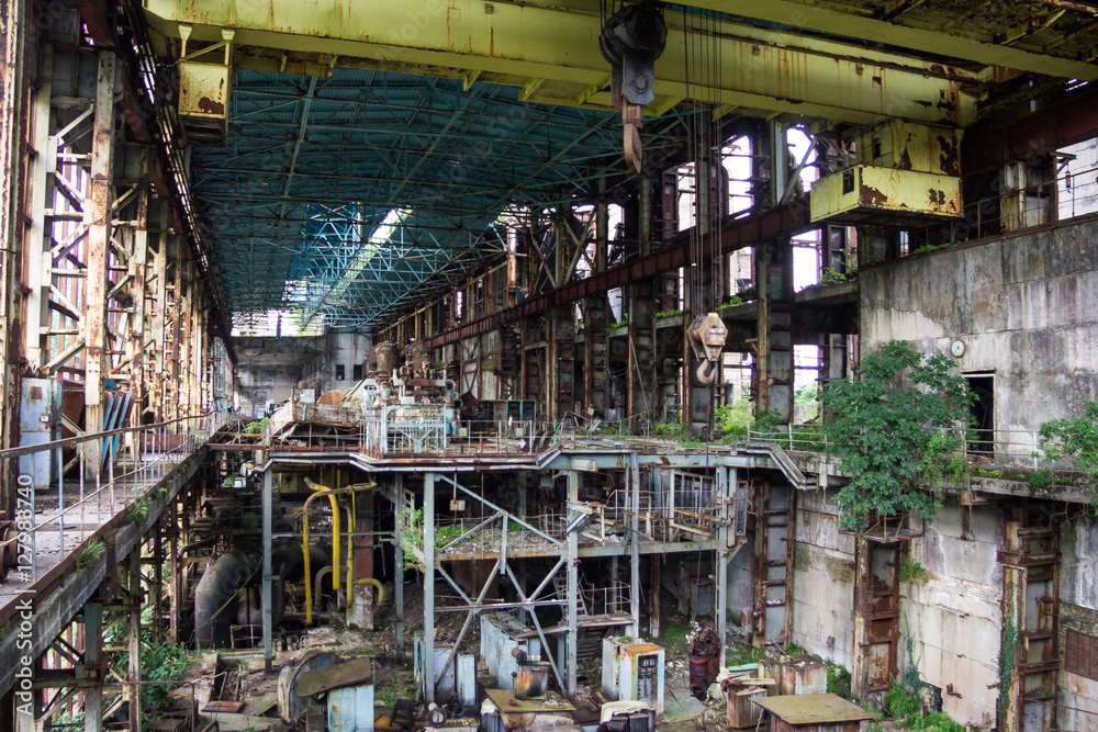 Abandoned, destroyed by war and owergrown machinery of Tkvarcheli power plant 